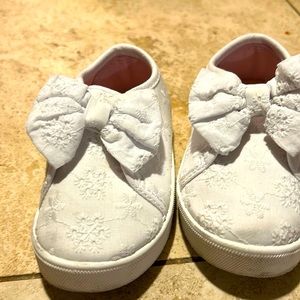 White eyelet sneakers